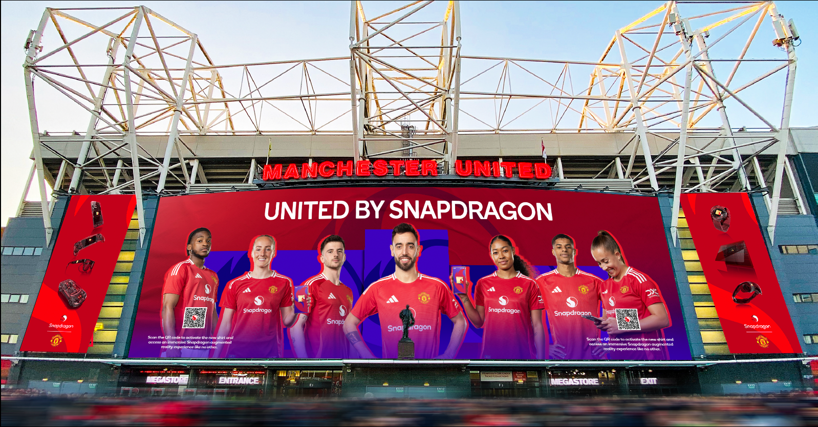 United by Snapdragon stadium exterior takeover — full-front LED wrap of Old Trafford with the squad in Snapdragon kit